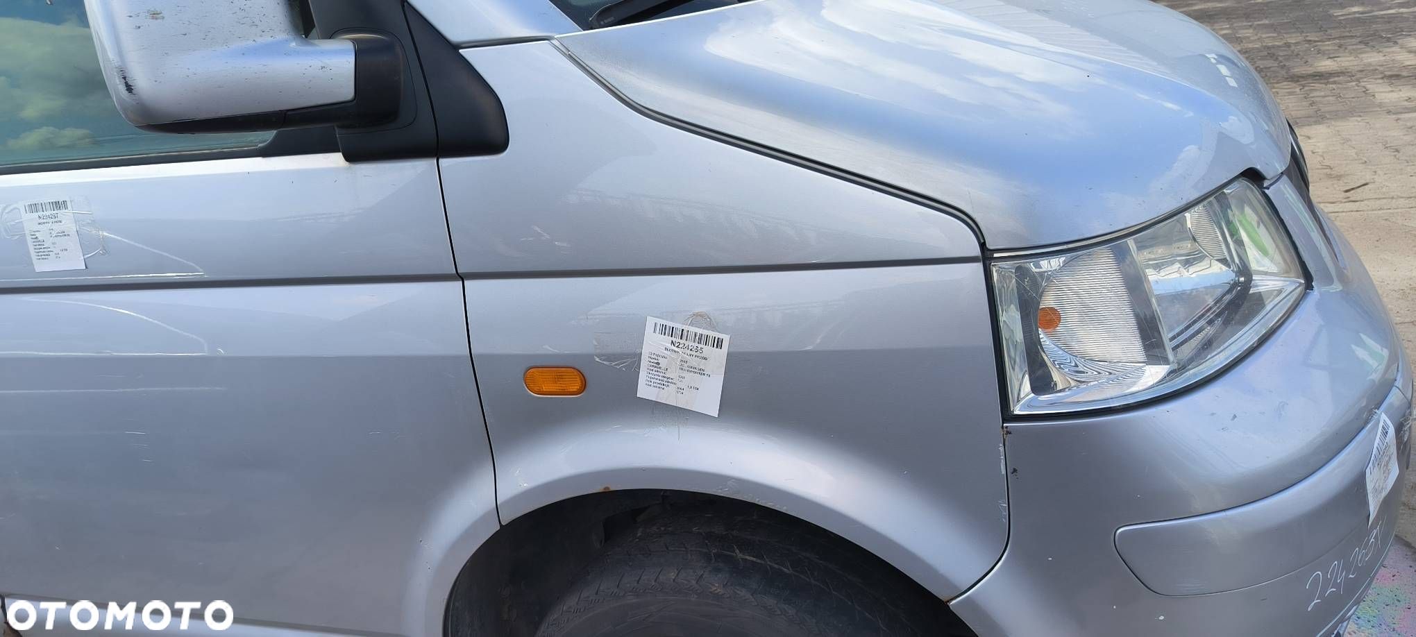 BŁOTNIK PRAWY PRZÓD VOLKSWAGEN TRANSPORTER T5 CARAVELLE - 1