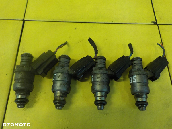 AUDI A3 8P 1.6 8V 11r 102KM wtrysk wtryskiwacz 06A90603IBT