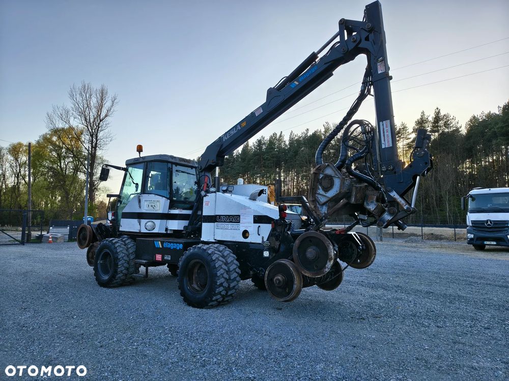 Caterpillar UNAC 300RR Mulczer kolejowy Liebherr atlas dwudrogowy zw - 6