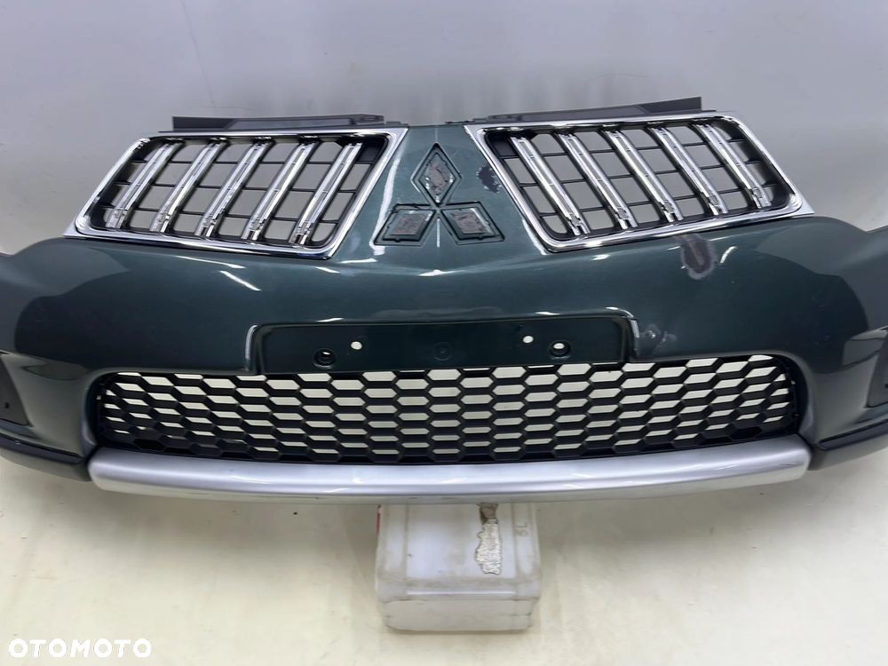 Zderzak przedni Mitsubishi Pajero Sport 2 L200 10-15r. Lift przód 6400B862 - 4