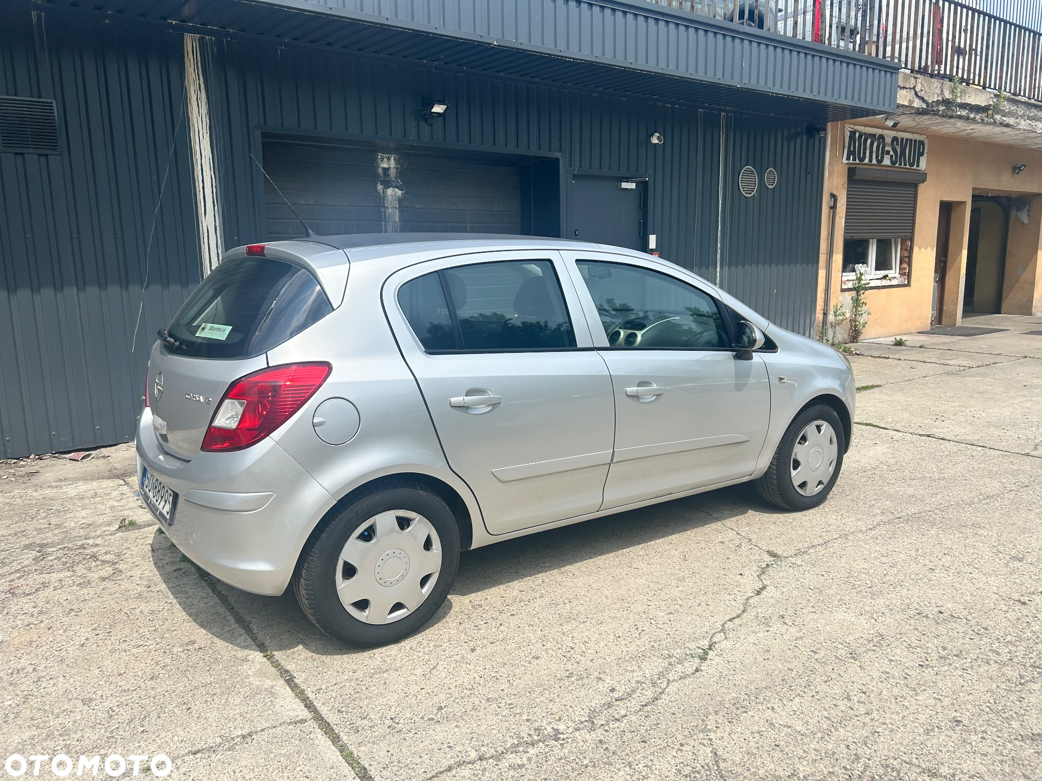 Opel Corsa 1.2 16V Cosmo - 11