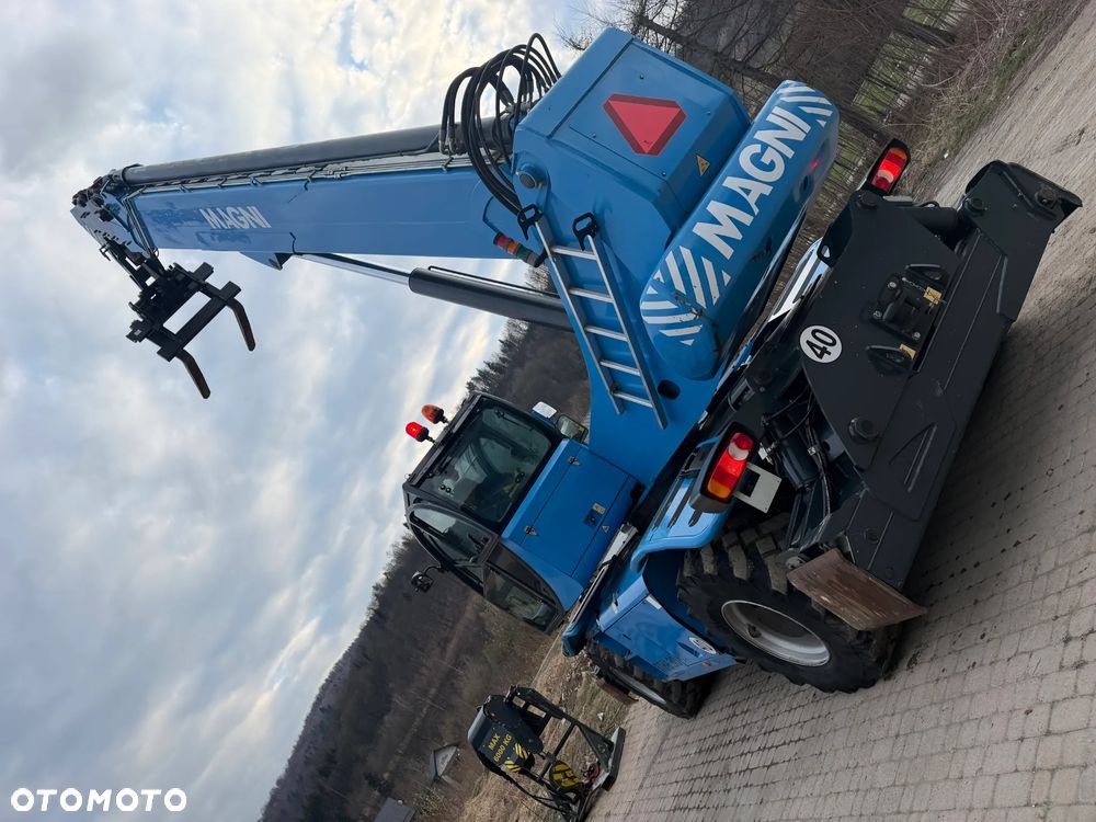 Magni RTH 6.30 SH-M/C . Ładowarka Teleskopowa Dźwig Zwyżka 30 metrów wysuw . Udźwig 6 ton. 4391 mtg Kosz (Pilot 2 funkcje) Wciągarka hydr. Widły. Jak Nowa z Norwegii! 2018rok. KLIMA Webasto post. Aktualna DEKRA 2026r. skręt 4 koła KRAB. Auto-poziomowanie! Zero luzów wycieków jak Nowa z salonu. Pełny Obrót. Małe Gabaryty maszyny. Mała waga 21 ton a potężny zasięg i udzwig! - 18