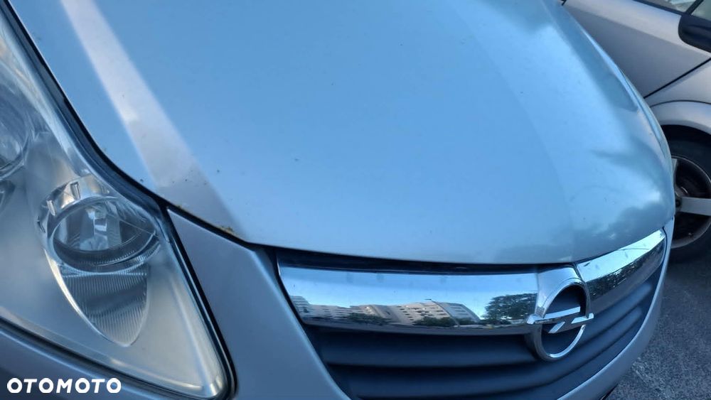 Opel Corsa 1.2 16V Enjoy - 11