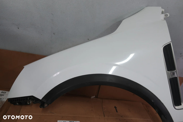 OPEL ANTARA BŁOTNIK LEWY PRZÓD GAZ 06-11R