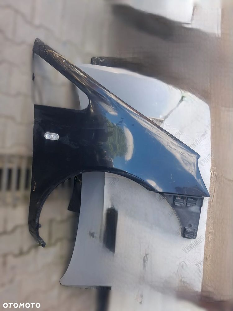 Błotnik FORD GALAXY I  prawy  OE - 1