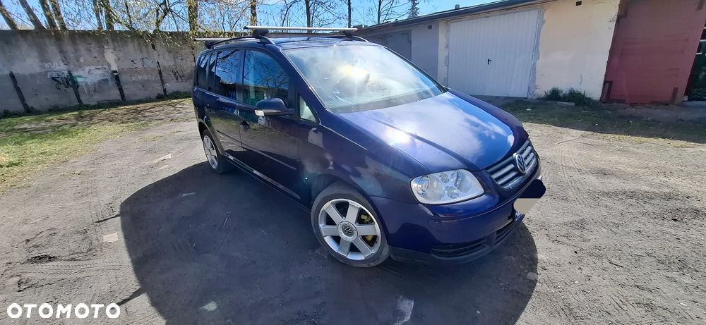 Volkswagen Touran 1.9 TDI Conceptline DSG - 1