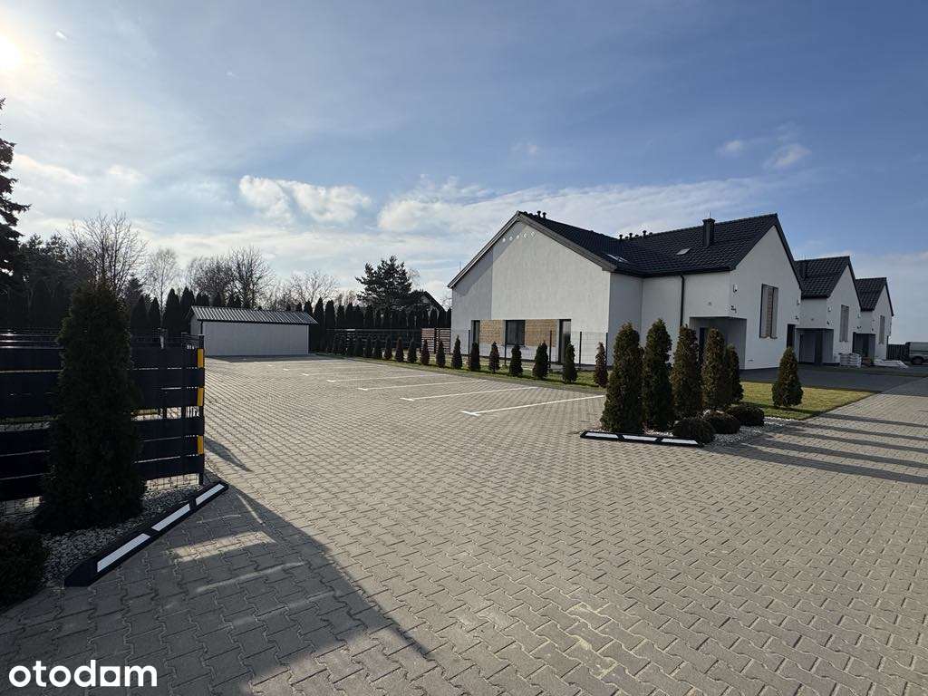 Dwupoziomowy segment z ogrodem i tarasem