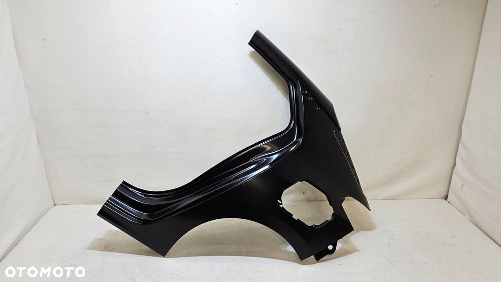 BŁOTNIK TYŁ TYLNY LEWY OPEL CORSA F 1692299980 ORYGINAŁ NOWY