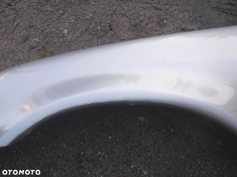 Mercedes ML FL Lift blotnik lewy  bez rdzy 693 C693 - 7