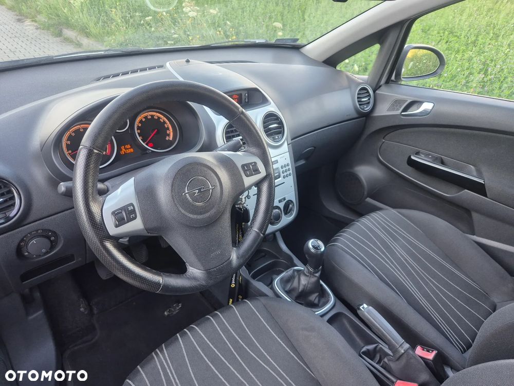 Opel Corsa 1.2 16V Enjoy - 23