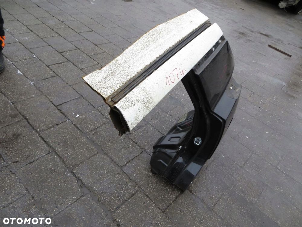 SSANGYONG TIVOLI BŁOTNIK LEWY TYŁ TYLNY LAK 14- - 2