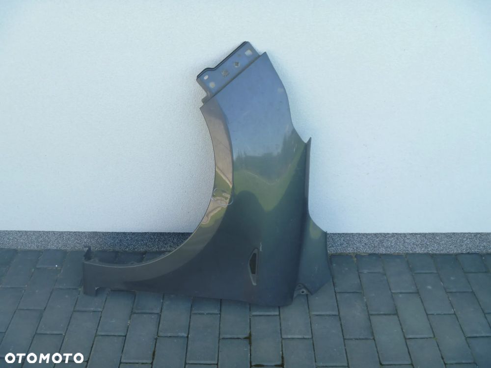 FORD KA + PLUS BŁOTNIK PRZEDNI LEWY - 1