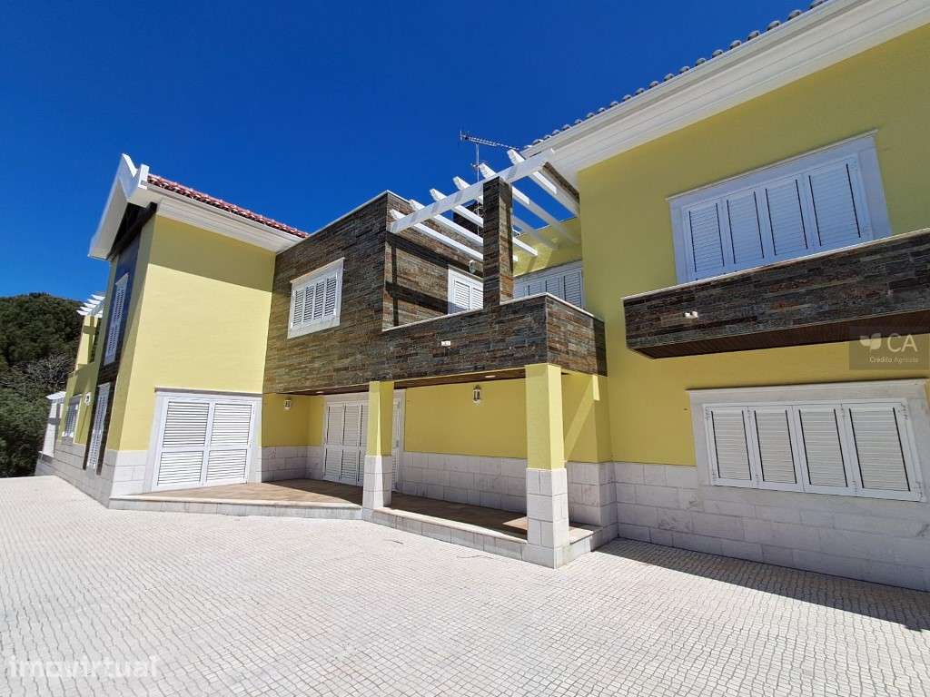 Moradia com 1.163,11m² inserida em terreno com 4.857m², situada em ... - Grande imagem: 2/22