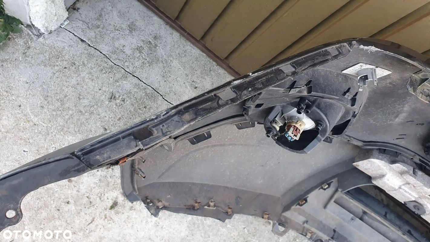 Opel Antara lift 10- zderzak przedni przód $ - 7