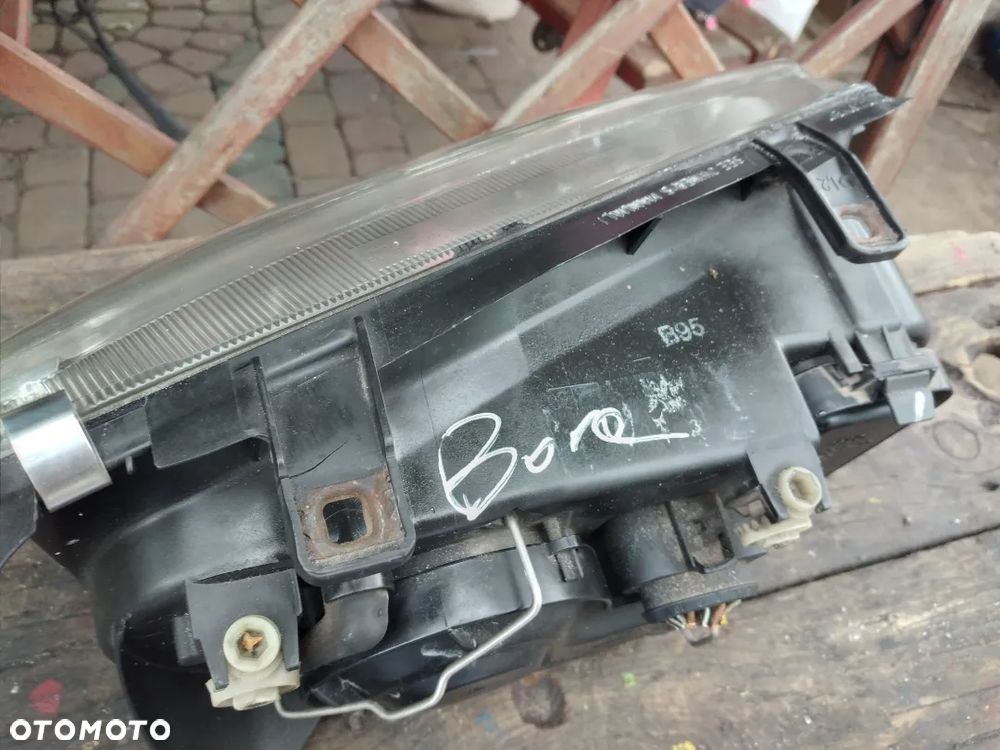 Lampa lewa VW BORA HELLA EUROPA - 4