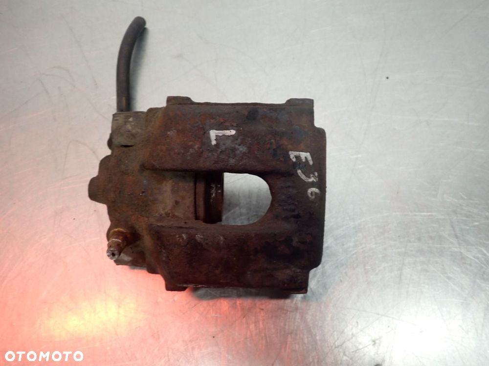 ZACISK HAMULCA LEWY TYŁ BMW E36 - 2