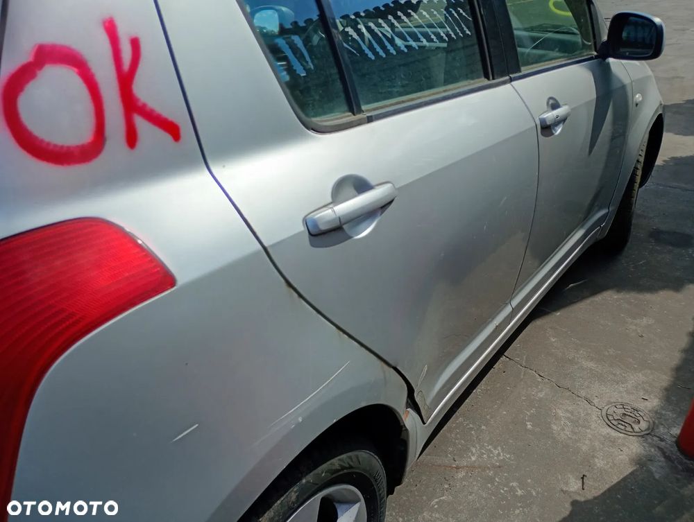 SUZUKI SWIFT 04-08 1.3 M13A - OSLONA  PRZECIWSLONECZNA LEWA PRAWA - 9