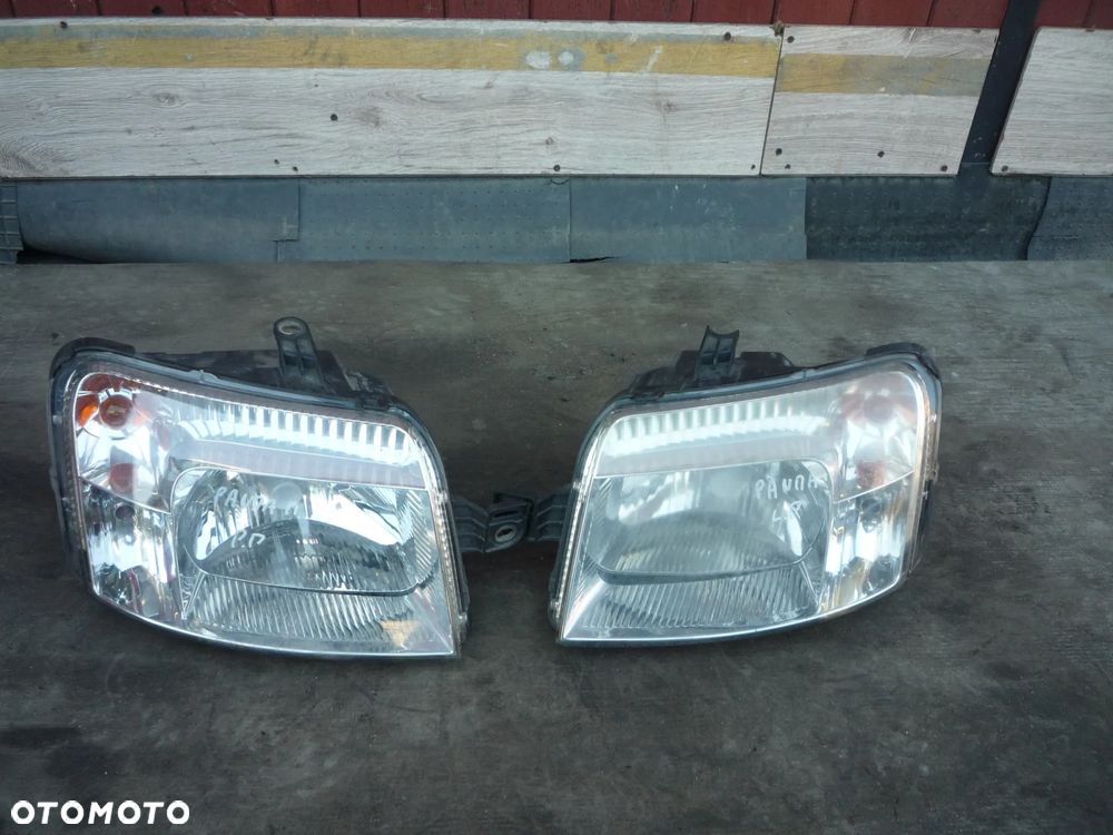 FIAT PANDA II LAMPA PRZEDNIA LEWA LUB PRAWA BIAŁA WTYCZKA - 1