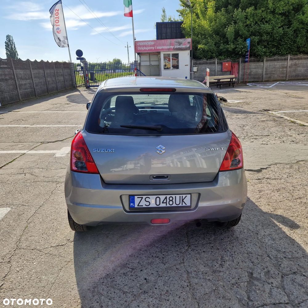 Suzuki Swift 1.3 Club - 7