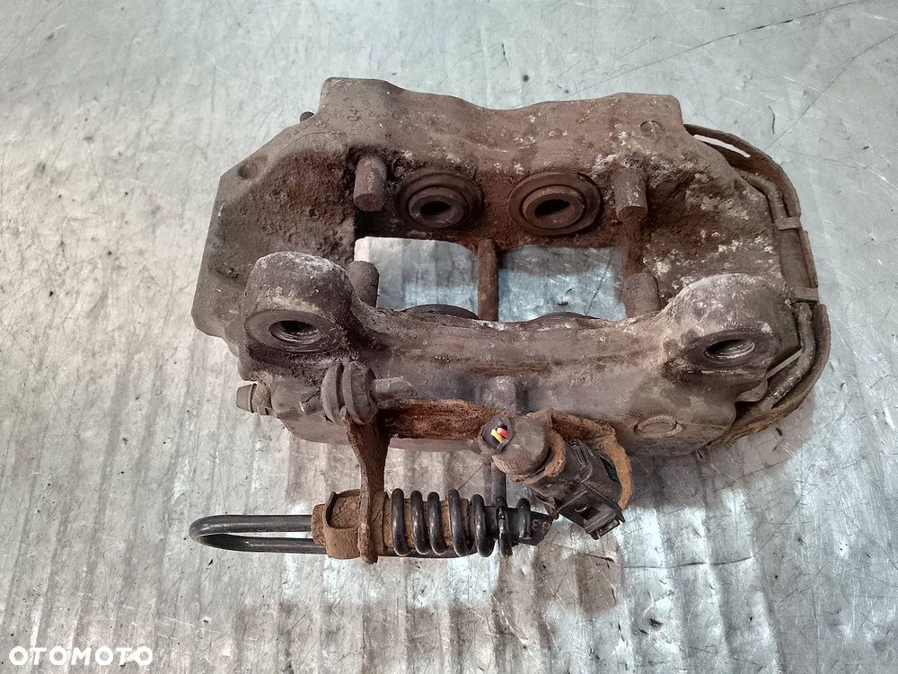 ZACISK HAMULCOWY PRAWY TYŁ PORSCHE CAYENNE 3.2 V6 - 5