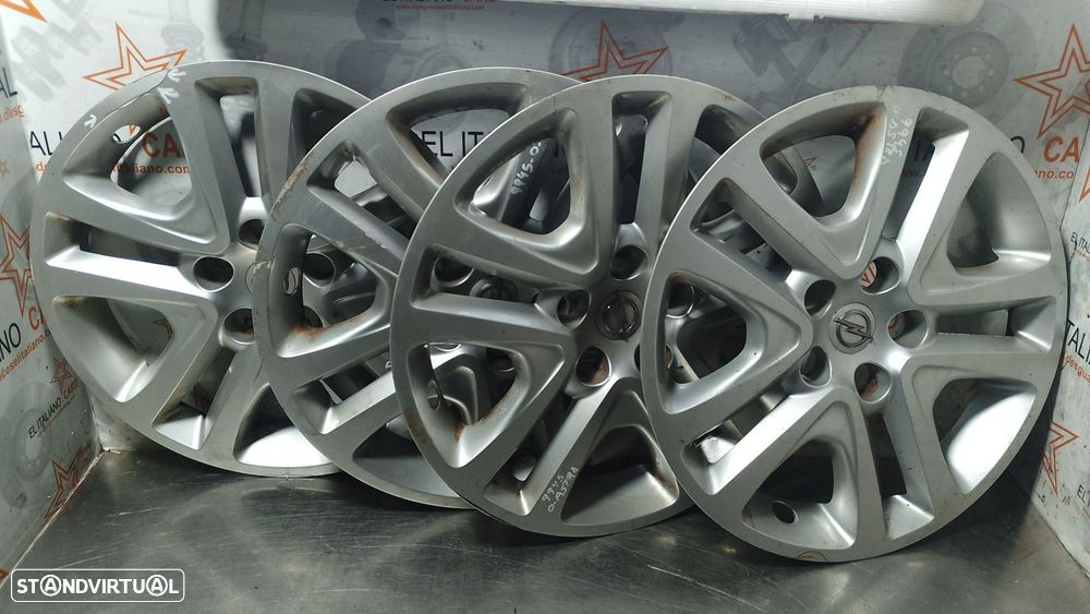 CALOTAS OPEL ASTRA - 1