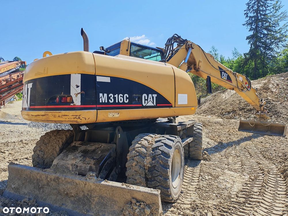 Caterpillar M316C - 3