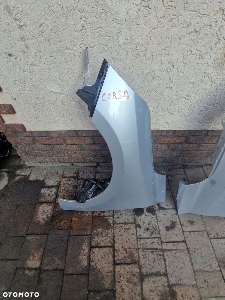 błotnik przedni lewy lub prawy opel corsa f - 2