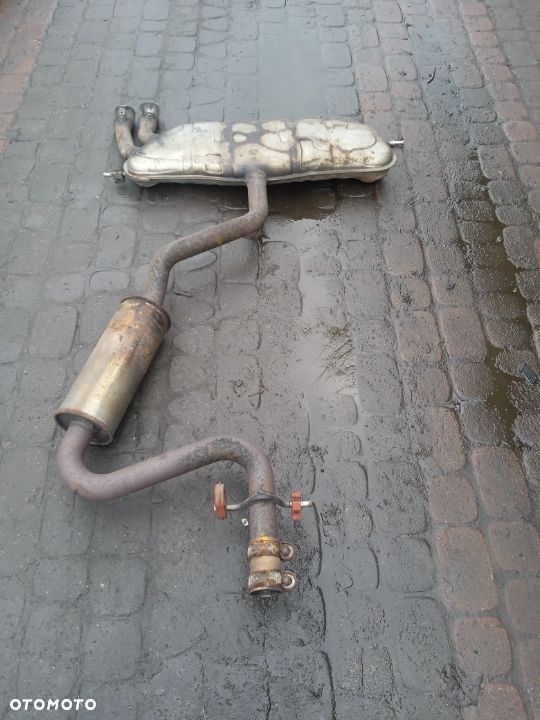 WYDECH TŁUMNIK VOLKSWAGEN GOLF V 3D - 1