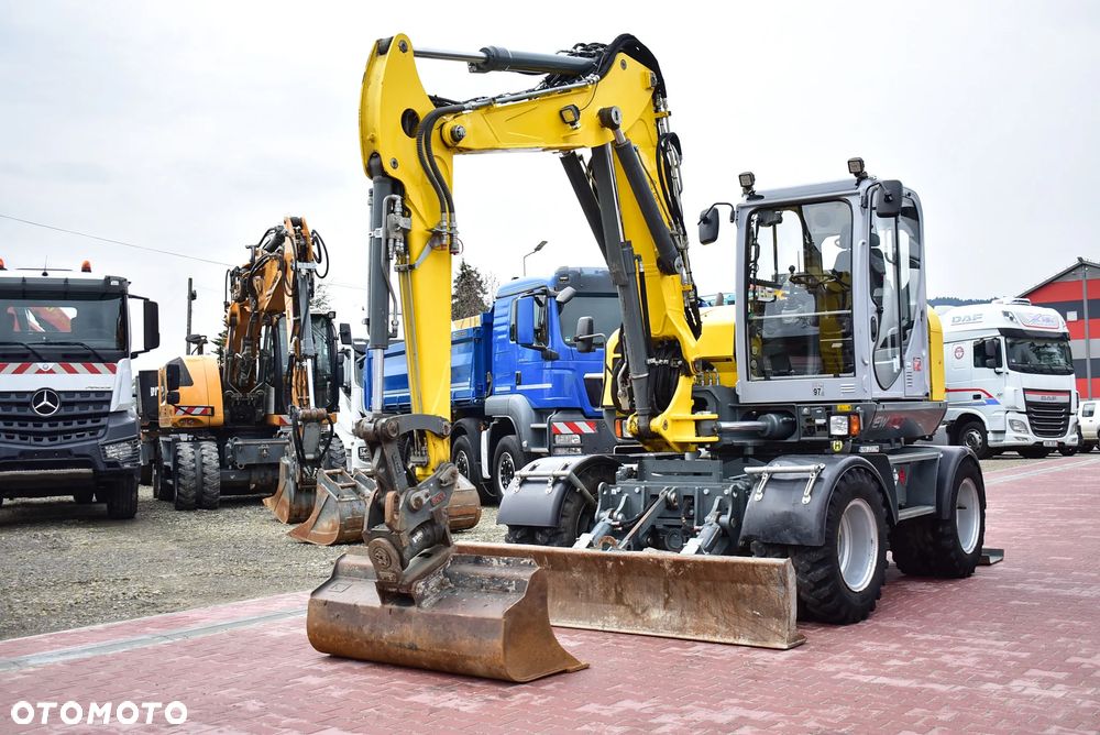Wacker Neuson EW 100 Koparka kołowa 10.5 T/ Powertilt/ 4 Łyżki/ Podpory + Pług/ 2021/ 3.700 Mth/ Sprowadzona z Austri ! - 2