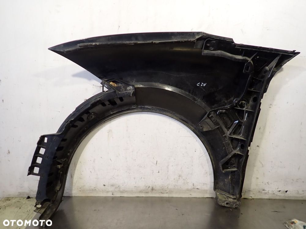 BŁOTNIK PRAWY PRZEDNI AUDI A2 - 4