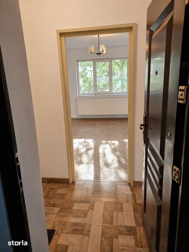 3 camere parter, bloc cărămidă | Libertății | 49 mp utili+ 2 balcoane — fotografia 1