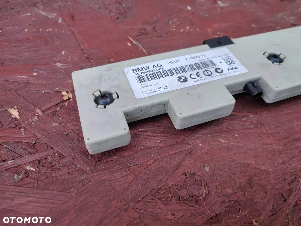 BMW E82 / E90 / E90 LCI / E92 / E92 LCI. ORYGINALNY MODUŁ ANTENY DIVERSITY / WZMACNIACZ ANTENY O NR: 6 928 934 / 9 187 658 OEM. DZIAŁAJĄCY W 100%. - 3