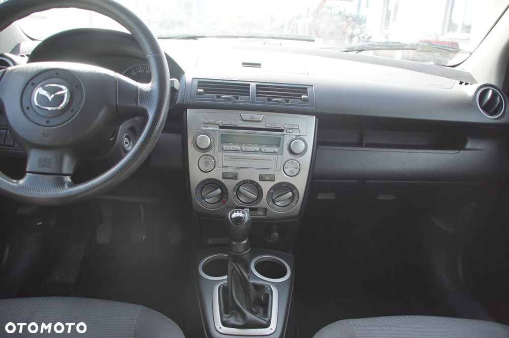 Auto na części - Mazda 2 DY Lift 1.4 CITD 67 KM F6JA 2N1R-7F096-AB 2006R Silnik Skrzynia Drzwi Szyba Lusterko Maska Klapa Lampa Zderzak Deska Kokpit Sterownik Moduł - 14