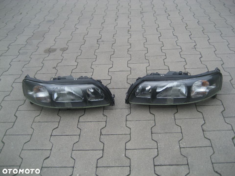 volvo s60 00-04r lampy przód prawa lewa oryginalne 8693577 8693578 europa