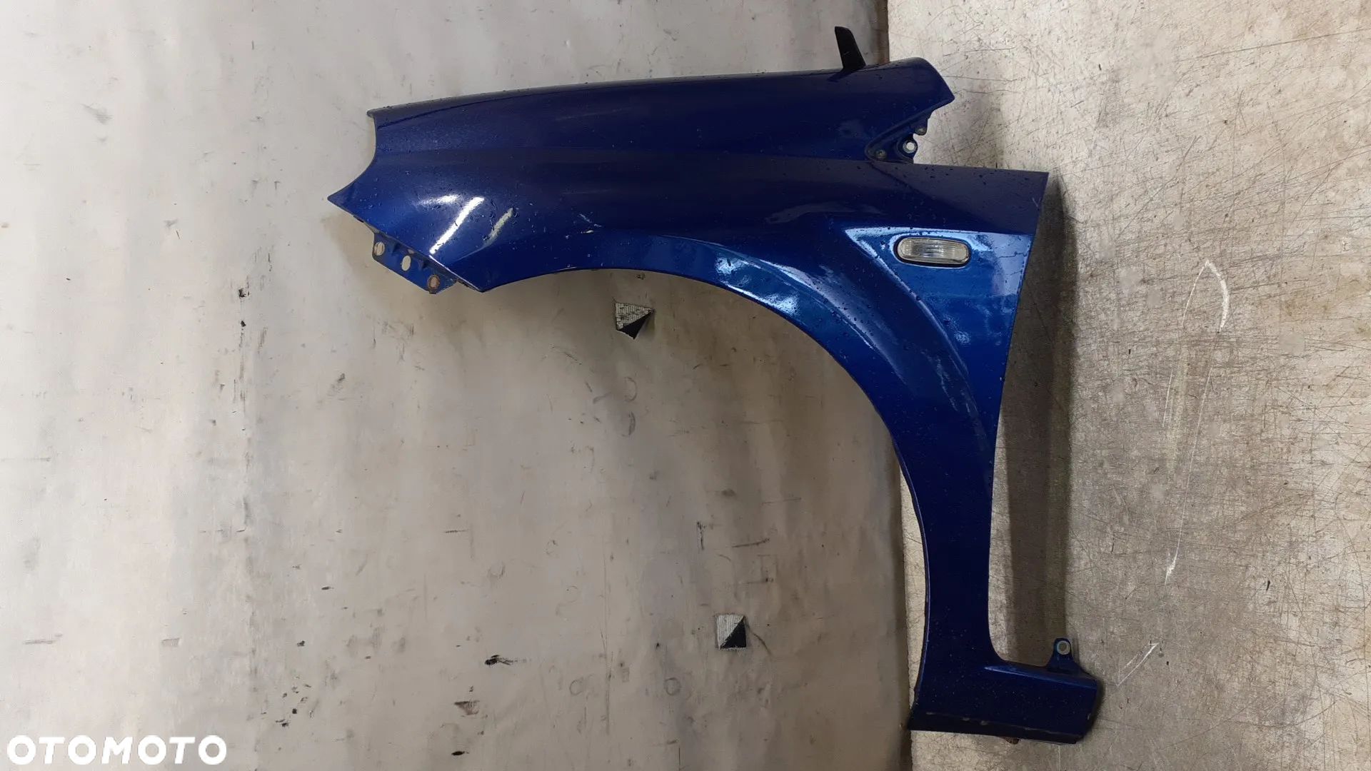 * FIAT GRANDE PUNTO  BŁOTNIK LEWY PRZEDNI 599A NIEBIESKI - 1