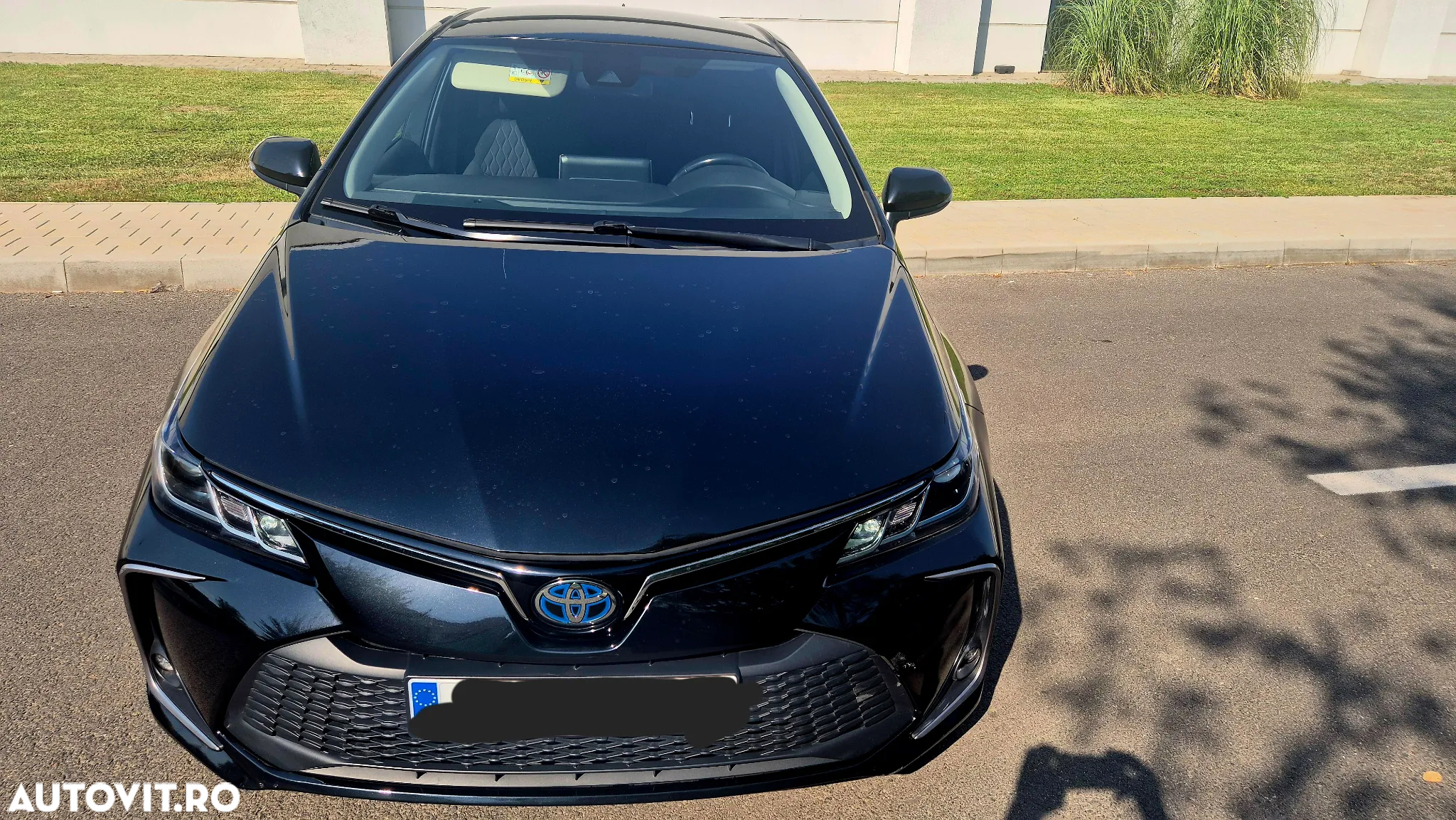 Toyota Corolla Sedan 1.8 HSD Business - 13