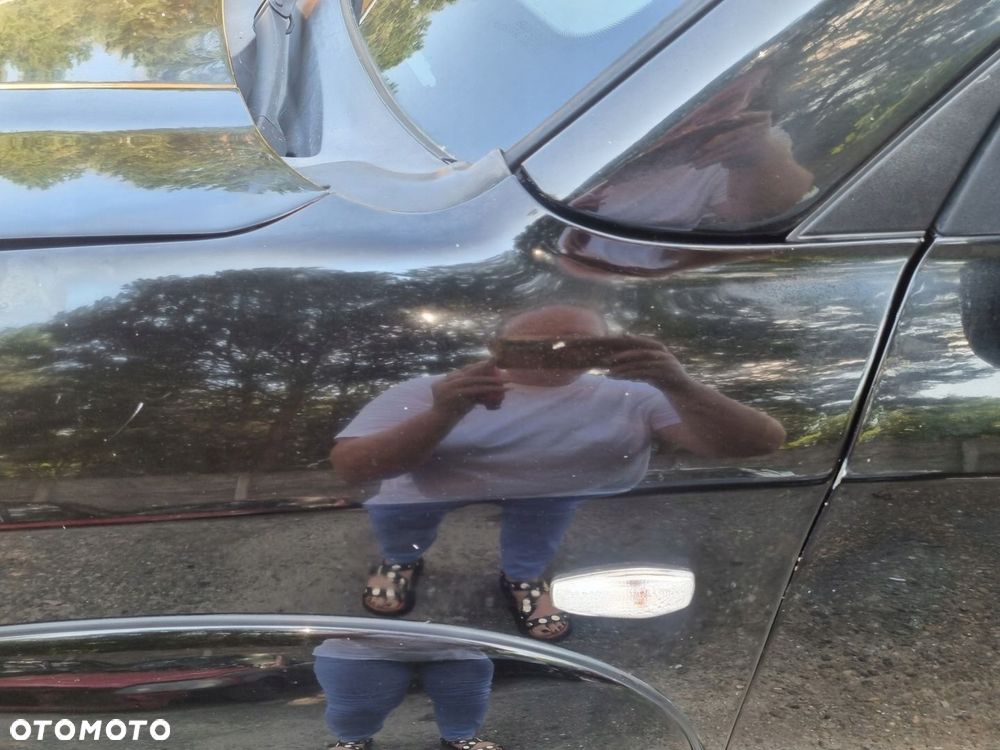 HYUNDAI TUCSON I 04-10 2007 r. EB BŁOTNIK LEWY PRZÓD LP Z LISTWĄ - 6