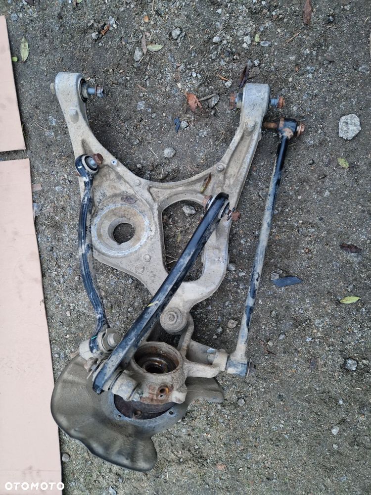 Mercedes ML GL zwrotnica lewy tył A16605 - 1