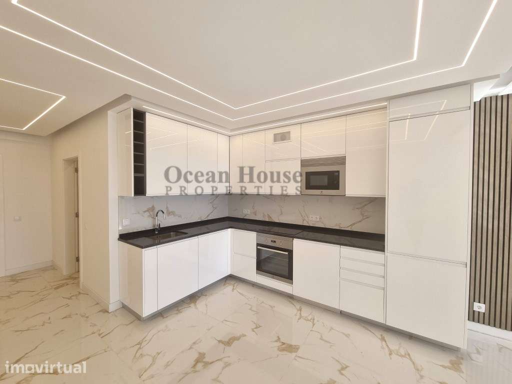 Apartamento T2 renovado com vista mar e garagem - Quarteira - Grande imagem: 4/24