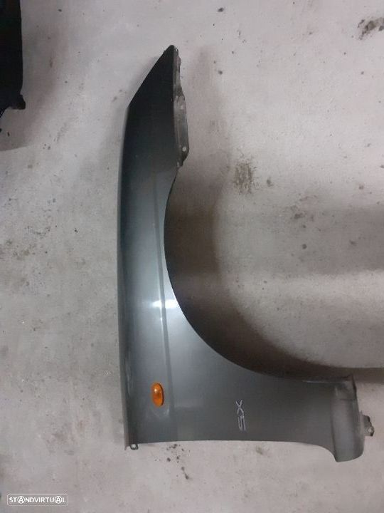 Guarda lamas passageiro daewoo nubira ano 2000 - 1