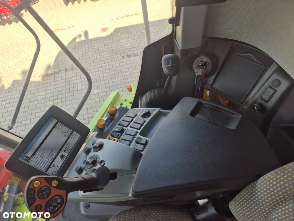 Claas Tucano 440 z hederem Vario 620 i przystawką do kukurydzy Olimac - 19