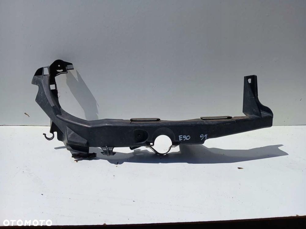 SLIZG POD REFLEKTOR LAMPE PRAWY BMW 3 E90 E91 04-08r. 7116708 - 1