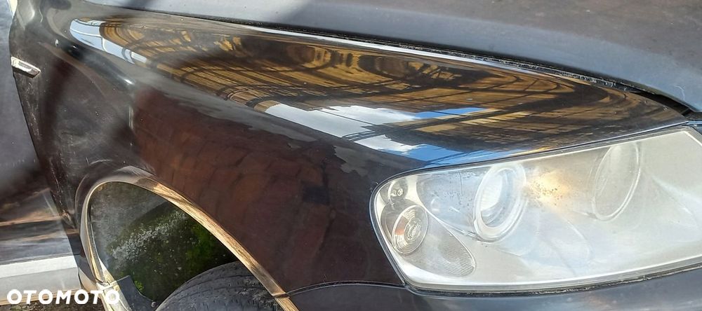 BŁOTNIK PRZEDNI PRAWY VOLKSWAGEN TOUAREG I