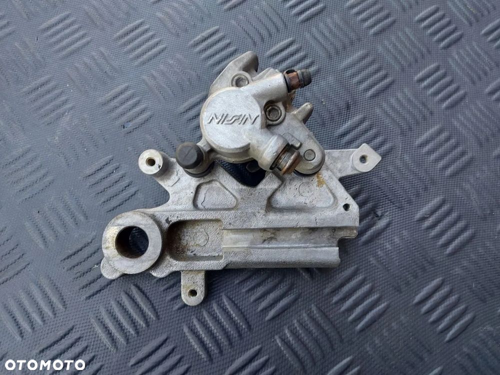 YAMAHA WR YZ YZF ZACISK HAMULCA TYŁ JARZMO