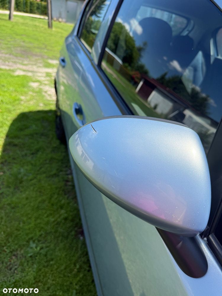 Opel Corsa 1.2 16V Cosmo - 13