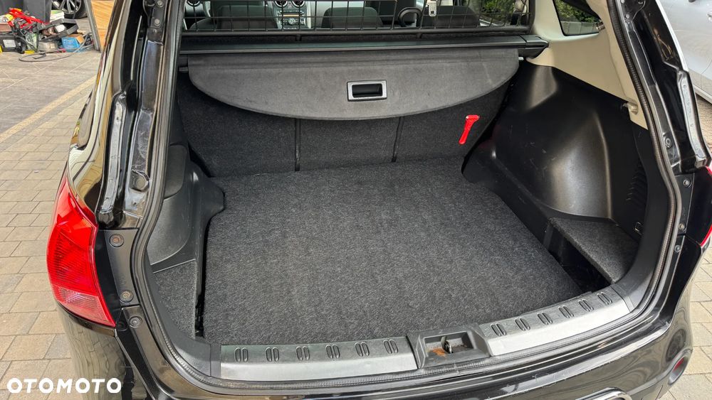 Nissan Qashqai+2 - 23