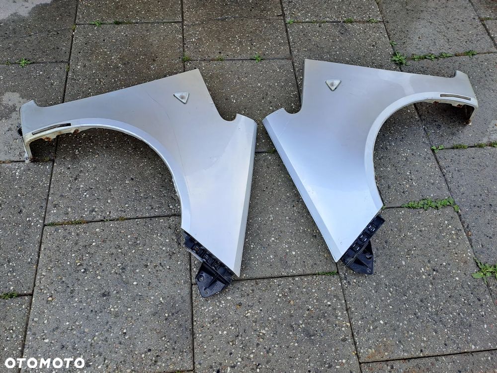 Mitsubishi Colt Z30 VI błotniki kod lakieru 21H - 23