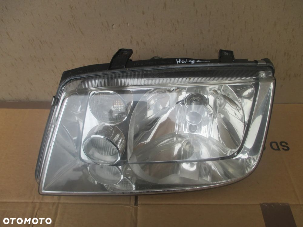 lampa lewa VW Bora Halogenowa Hella Europa - 1