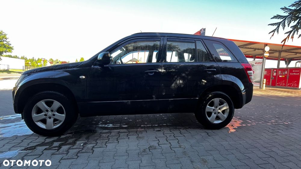 Suzuki Grand Vitara 2.0 Comfort + - 13