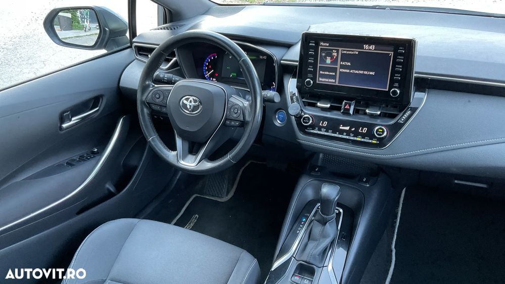 Toyota Corolla 1.8 HSD Business - 39
